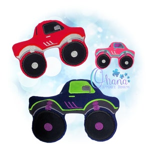 May include: Three embroidered monster truck applique designs. One red monster truck, one pink monster truck, and one blue monster truck with green accents.