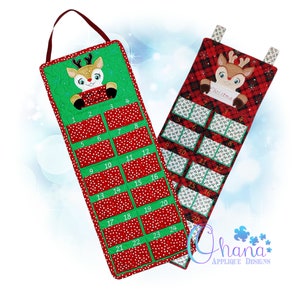 May include: Two Christmas advent calendars with a reindeer design. One calendar is green with white polka dots and the other is red with a plaid pattern. Both calendars have 24 numbered pockets.