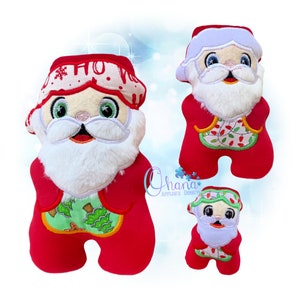May include: Three plush Santa Claus toys in different sizes. The largest Santa is wearing a red suit with a green and white applique of a Christmas tree. The middle Santa is wearing a red suit with a white applique of Christmas lights. The smallest Santa is wearing a red suit with a green and white applique of a Christmas tree.