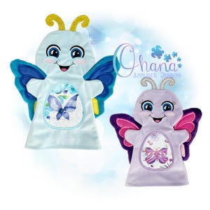May include: Two plush butterfly puppets. One is light blue with blue and yellow accents, the other is lavender with purple and pink accents. Each has a smiling face, antennae, and a butterfly design on the body.