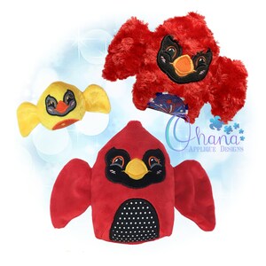 May include: Three plush bird toys. One is a yellow bird with a red beak and black eyes. Another is a red cardinal with a black beak and white polka dots on its belly. The third is a red cardinal with a black beak and black eyes. The background is a light blue with white circles.