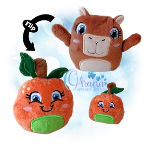 May include: Three plush toys: a brown animal with outstretched arms, and two orange fruit-shaped toys with smiling faces. The toys have blue eyes, green accents, and are designed with a soft, plush material. The image includes a "Flip" arrow.