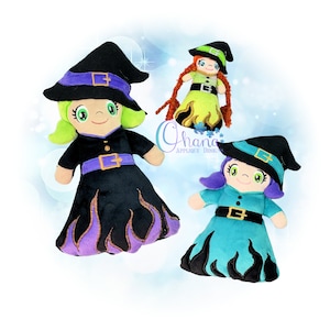 May include: Three plush witch dolls with black hats, green, purple, and red hair, and flame-shaped skirts. The dolls are wearing black, green, and blue dresses with purple, yellow, and orange accents.