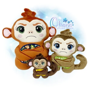 May include: Three plush monkey toys in varying sizes. The largest monkey is brown with green eyes and a grumpy expression. The middle-sized monkey is also brown with blue eyes. The smallest monkey is brown with a yellow wrap. The text "Ohana Applique Designs" is in the background.