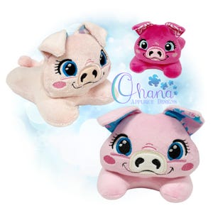 May include: Three plush pig toys featuring embroidered details, including large blue eyes, pink cheeks, and patterned inner ears. Two pigs are light pink, and one is bright fuchsia. The text Ohana Applique Designs is visible in the center.