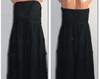 Abito nero in pizzo trasparente, con spalle scoperte, modello svasato, taglia M/L