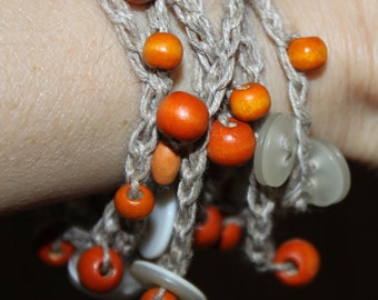 linen thread crocheted bracelet with wooden beads and buttons, can be used as a necklace