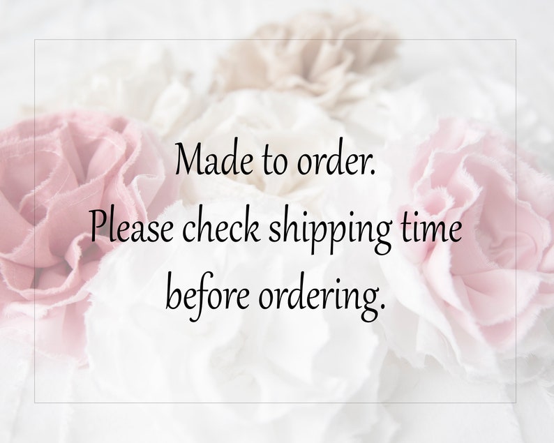 May include: A close-up of a text overlay on a white background with pink and white fabric flowers. The text reads "Made to order. Please check shipping time before ordering."