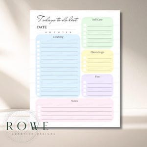 May include: A daily planner sheet titled Todays to do list with a date line and days of the week. It features a large light blue section for Cleaning, and smaller colored boxes for Self Care, Places to go, Fun, and a pink section for Notes.