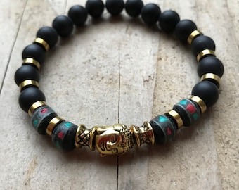 Tibetan bracelet in black onyx bead and encrusted yak bone