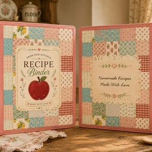 May include: Two recipe binders featuring a patchwork design in pink, blue, and white. The left binder displays an apple graphic and the text "FROM OUR KITCHEN RECIPE BINDER MADE WITH LOVE". The right binder features the text "Homemade Recipes Made With Love".