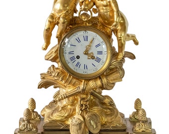 Antique french XIX century gilded bronze clock