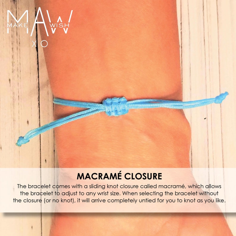 May include: A light blue bracelet with a macrame closure. The bracelet is adjustable and can be worn on any wrist size. The text "MAW MAKE WISH XO" is visible in the background.