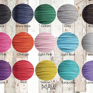 May include: A color chart of 15 different colors of cord, including black, navy blue, green, grey, brown, hot pink, orange, light pink, light blue, white, purple, red, yellow, turquoise, and lavender.