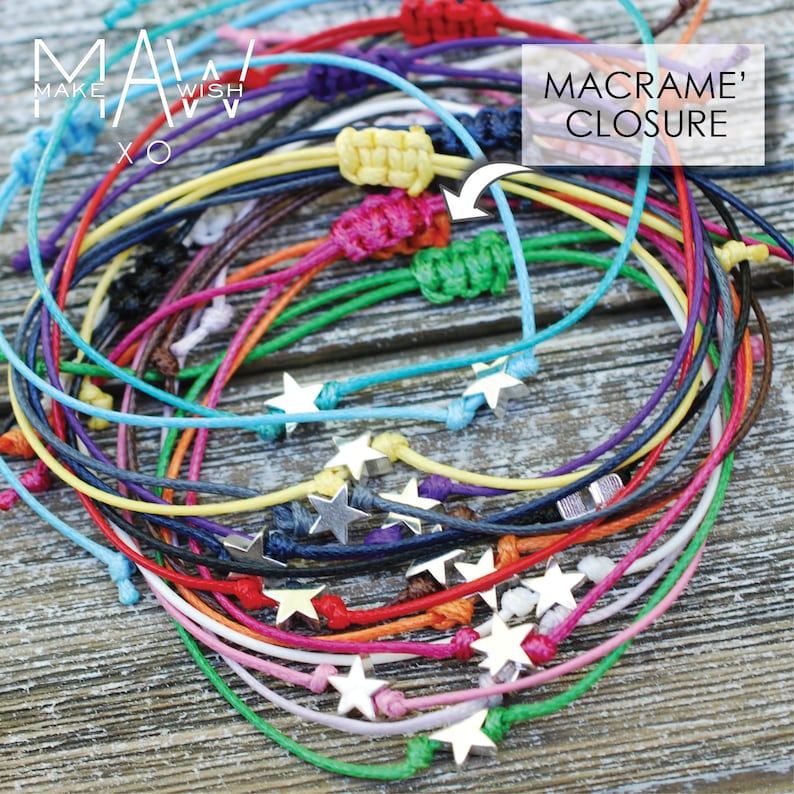 May include: A collection of colorful bracelets with silver star charms and macrame closures. The bracelets are arranged in a circle on a wooden surface. The text "MAKE A WISH XO" is visible in the top left corner of the image. The text "MACRAME' CLOSURE" is visible in the top right corner of the image.