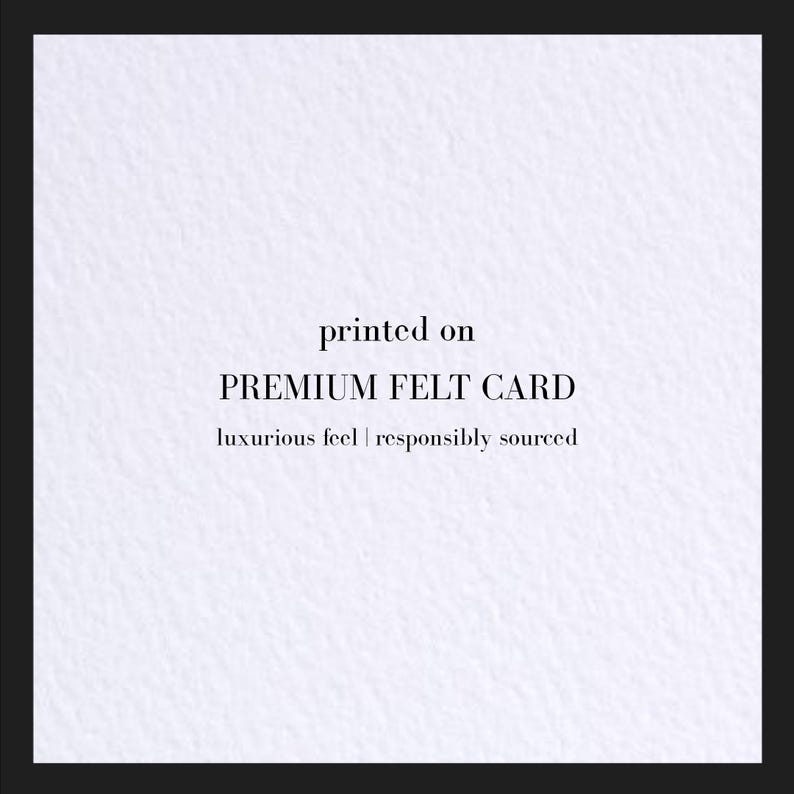 A sample of the felt textured natural white cardstock. Reads: printed on premium felt card. Luxury feel; responsibly sourced.