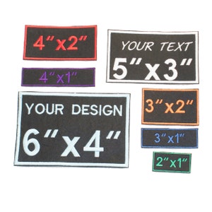 May include: A set of nine black iron-on patches with white text and different sizes. The patches include the text "YOUR TEXT", "YOUR DESIGN", and measurements in inches. The patches are 4" x 2", 4" x 1", 5" x 3", 3" x 2", 3" x 1", and 2" x 1".