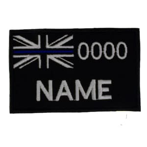 May include: Black embroidered patch with a white Union Jack flag, a blue thin line, and the text "0000 NAME".