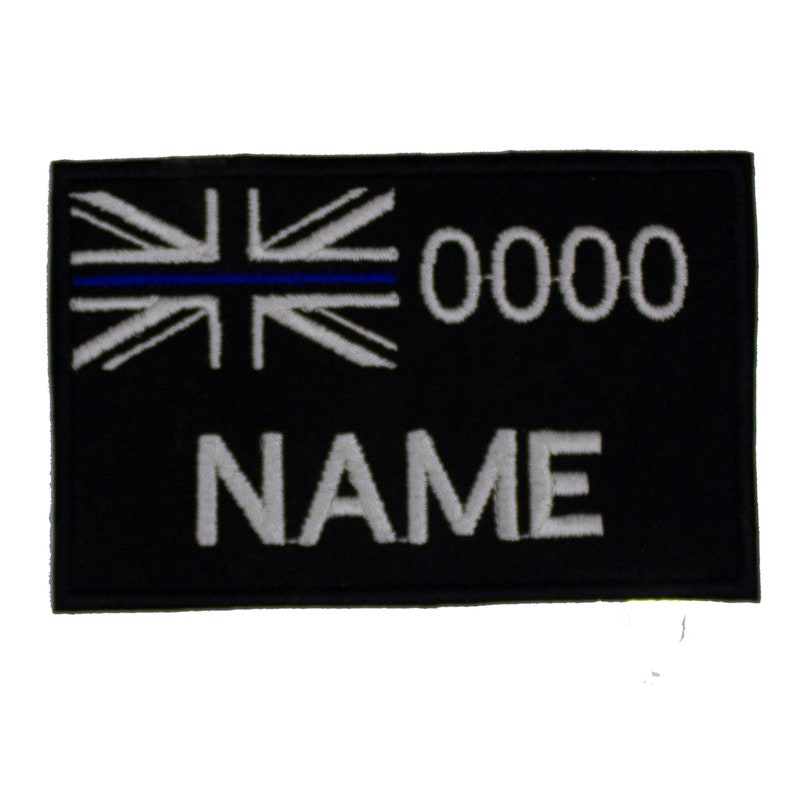 May include: Black embroidered patch with a white Union Jack flag, a blue thin line, and the text "0000 NAME".