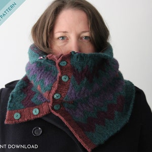 May include: A close-up of a knitted cowl with a geometric pattern in shades of teal, purple, and brown. The cowl has a button closure and is worn by a person.