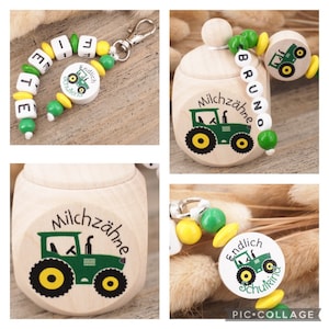 Milchzahndose und Anhänger mit Namen Traktor