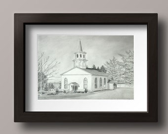 May include: A framed pencil drawing of a white church with a steeple. The artwork is set against a backdrop of trees and a cloudy sky. The frame is dark brown.