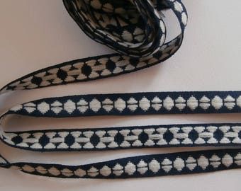 26 G - Off white and blue woven Ribbon