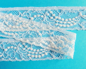 Dentelle fleurie blanche, élastique (réf 948 14 18)