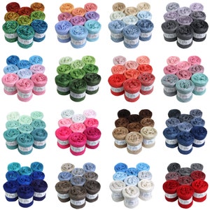May include: A collection of 24 skeins of yarn in various colours, including blue, green, pink, red, brown, and grey. Each skein is made of soft, textured yarn and is perfect for knitting or crocheting.