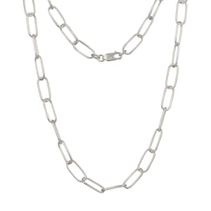 May include: A silver-colored chain necklace with elongated oval links. The necklace has a lobster clasp closure. The links are evenly spaced and create a simple, elegant design. The necklace is shown against a white background.