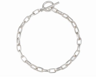 Bracciale a catena con maglie sottili a graffetta in argento sterling