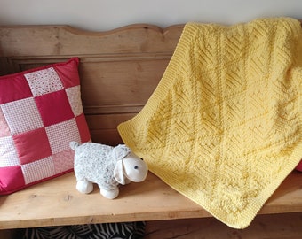 Modello per coperta per neonati in maglia grossa (PDF)