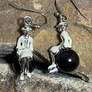 Woman Sitting on Black Marble Pierced Earrings Black & White Yin And Yang