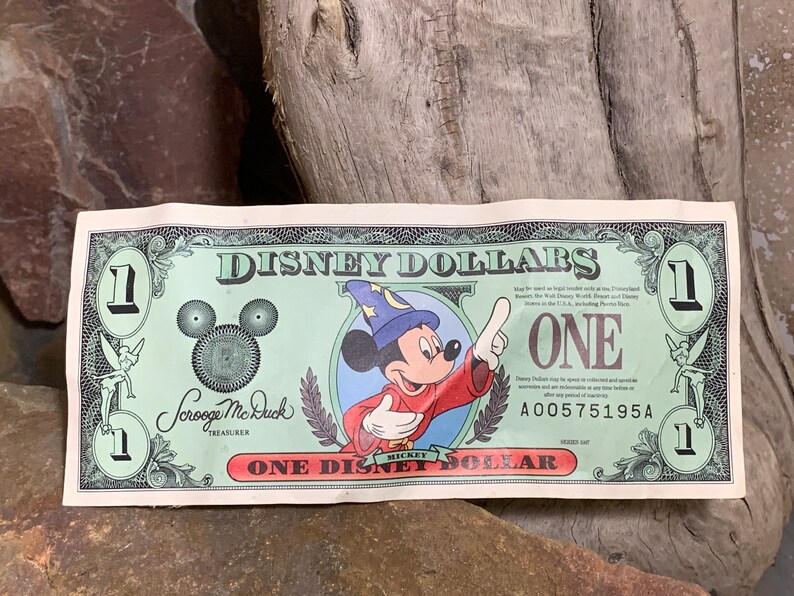 1997 A Disney Dollar Sorcerer Mickey front Cinderella Coach on back 25th Anniversary Disney World Extremely Rare image 1