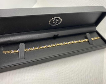 Preciosa pulsera de oro amarillo de 14k y tanzanita