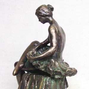 Classical style  sculpture,  dancer at rest