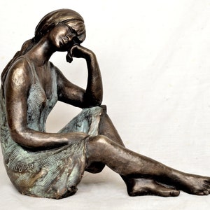 Cold cast bronze sculpture/statue, woman seated on floor