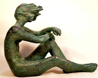 Classical style  sculpture by Lluis Jorda, seated nude woman