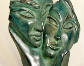Cold cast  Bronze sculpture, figure with masks