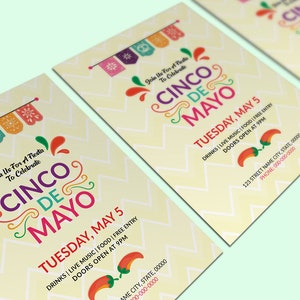 May include: A yellow and white invitation with a colorful Cinco de Mayo design. The text reads "Join Us For A Fiesta To Celebrate Cinco de Mayo" and "Tuesday, May 5. Drinks | Live Music | Food | Free Entry. Doors Open At 9PM."