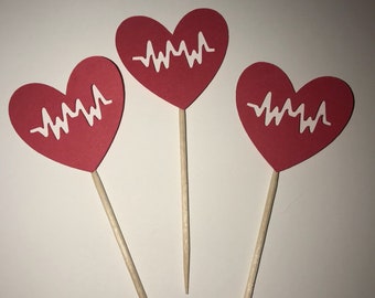 12 red heartbeat cupcake toppers.