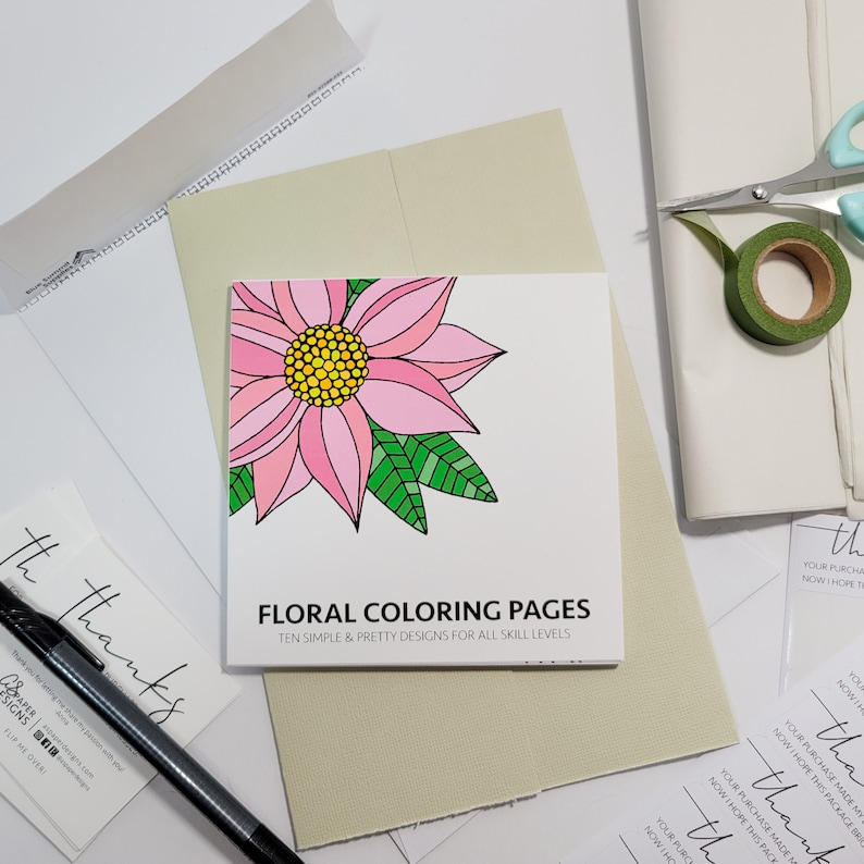 May include: A white card with a pink and green floral illustration and the text "Floral Coloring Pages" and "Ten simple & pretty designs for all skill levels".