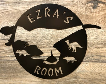 Placa con el nombre de la sala de los dinosaurios