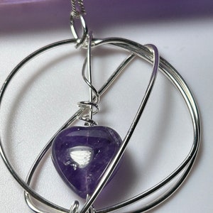 Heart shaped amethyst gemstone in silver wire wrapped pendant by Silver Wire Designs