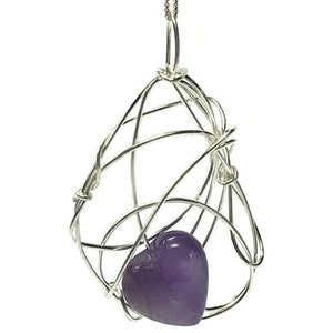 Amethyst necklace for women featuring a heart shaped amethyst gemstone in a wire wrapped pendant on chain.