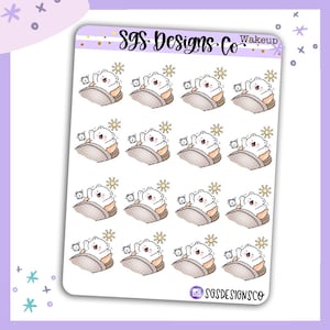 May include: A sticker sheet featuring sixteen identical illustrations of a white bear waking up in bed. Each bear is under a brown patterned blanket with a yellow sun, an alarm clock, and the text SGS Designs Co Wakeup at the top of the sheet.