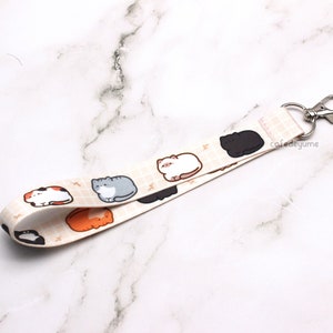 Cordón de pulsera Kitty Loaf / soporte para llavero