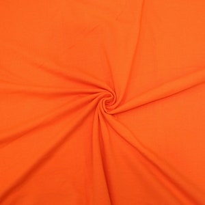 KNIT Fabric: Orange Cotton Spandex knit. Sold in 1/2 Yard Increments