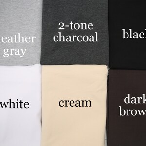 May include: Six fabric swatches in different colors: heather gray, 2-tone charcoal, black, white, cream, and dark brown.