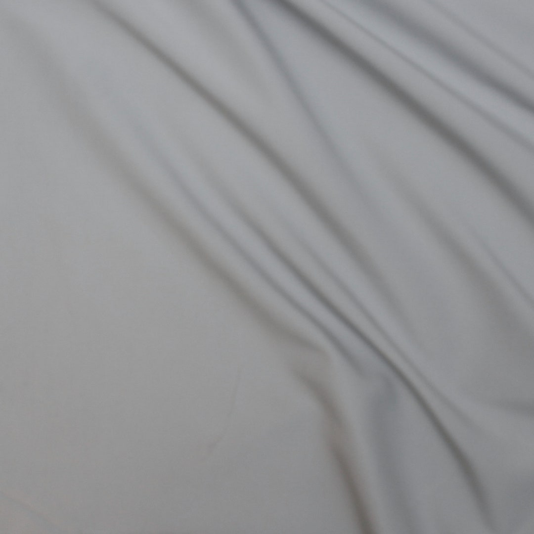 BOARD SHORT Fabric Light Gray Solid Board Short Fabric. Sold by the 1/